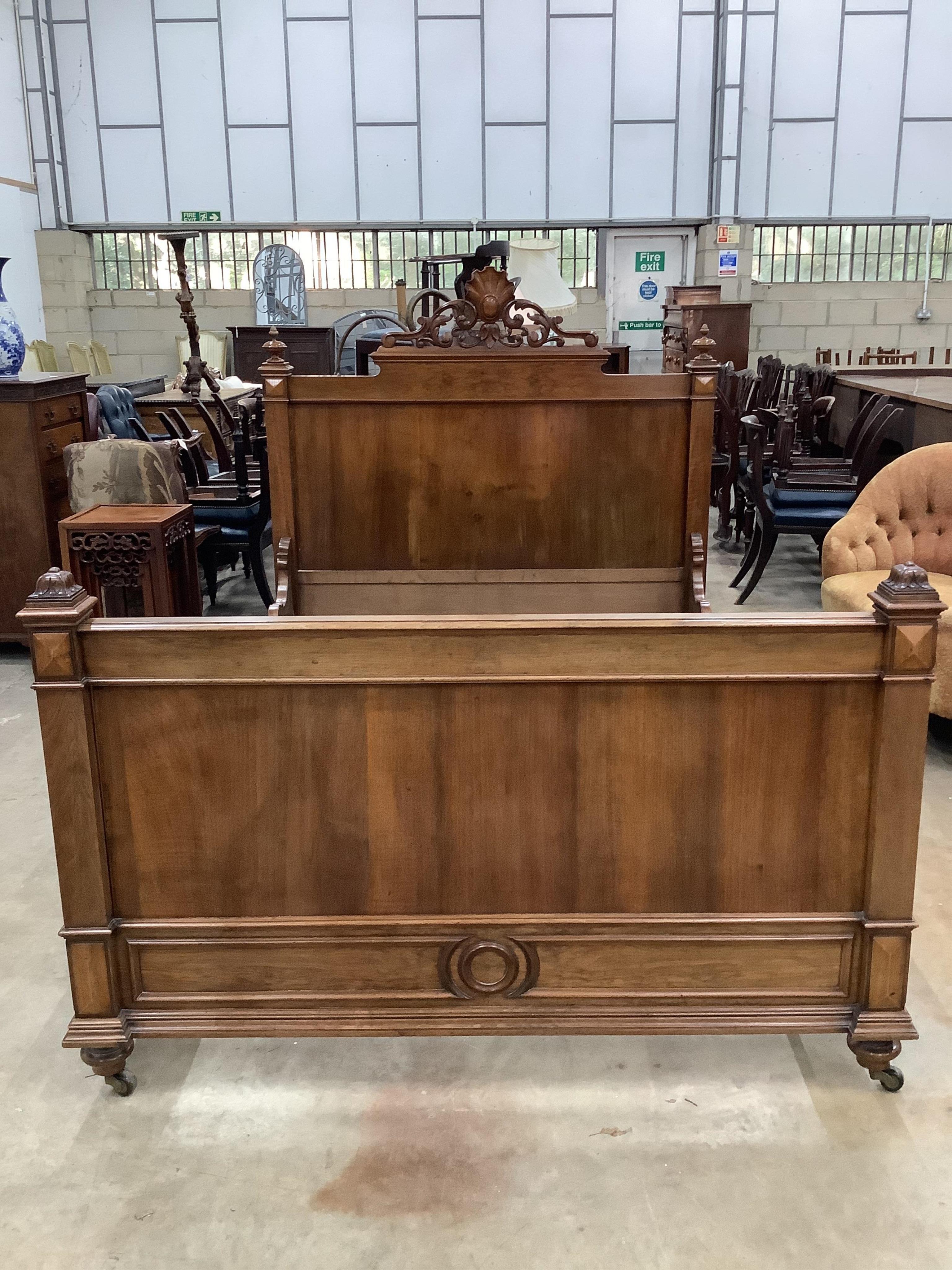 A late 19th century French walnut head and foot double bedstead, width 151cm, length 216cm. Condition - good